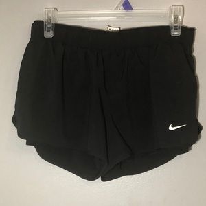 Split Nike running shorts